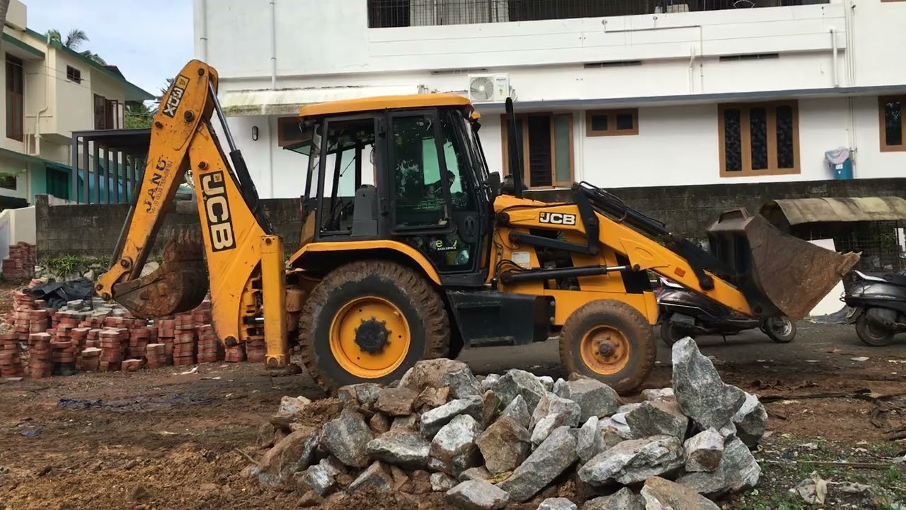 jcb 3dx moving rock pieces