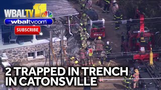 2 construction workers trapped in trench