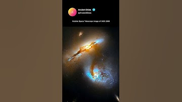 Colliding Galaxies: Hubble Captures UGC 2369 #shorts