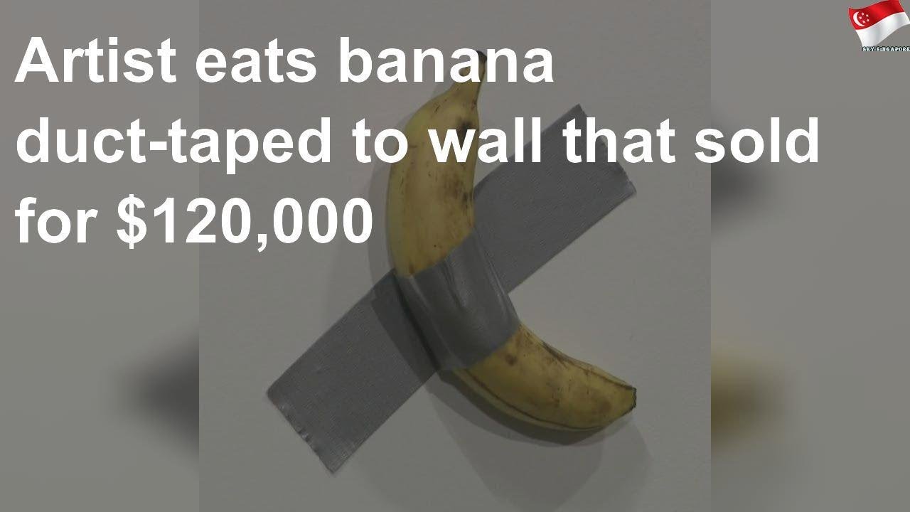 Artist eats banana ducttaped to wall that sold for 120,000 YouTube