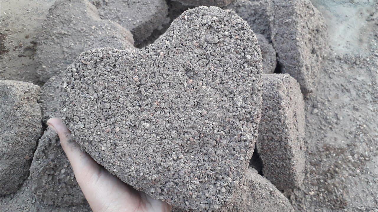 Brown grainy texture full of crunch heart crumbling on floor +in water...its so satisfying ASMR