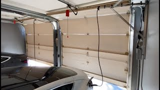 Affordable and convenient way to get Tesla cables off garage floor, tripfree charging from above!