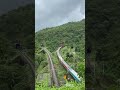Train coming out of a tunnel