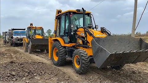 2 JCB 3dx Machines Loading Mud in TATA Dump Trucks Tippers together working with JCB 3dx Xpert