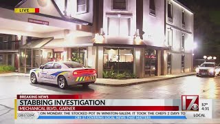 Person stabbed multiple times inside Garner motel room, police say