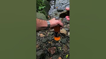 Bushcraft skills: DIY open a bottle cap without a opener #bushcraft #shorts #outdoors #skills #diy