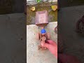 Tractor pulling water and playing with mud
