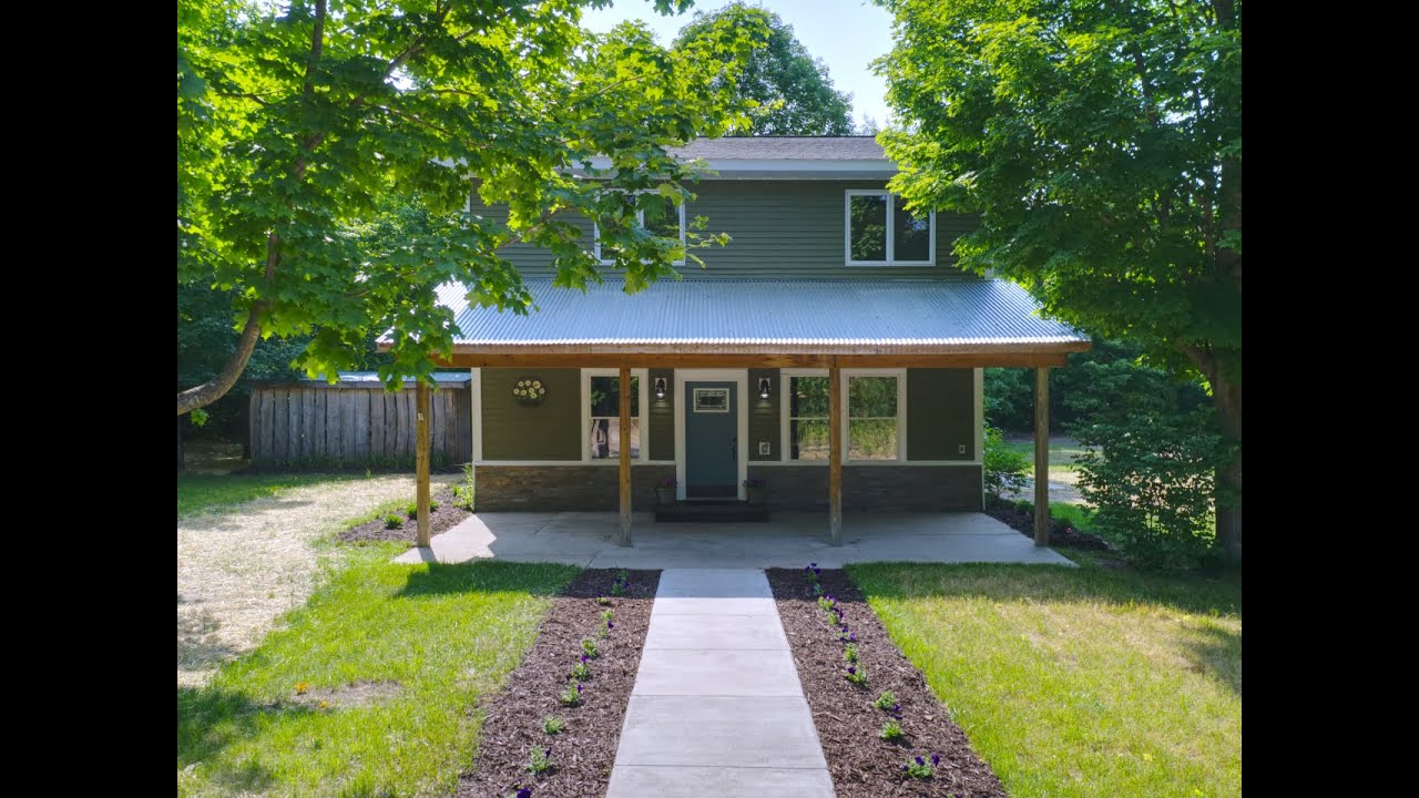 20 S Pine Tree Lane Beulah MI "Near & Nestled" in the Woods of