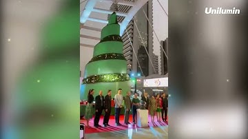 High Christmas tree-shaped LED display in downtown Bangkok.