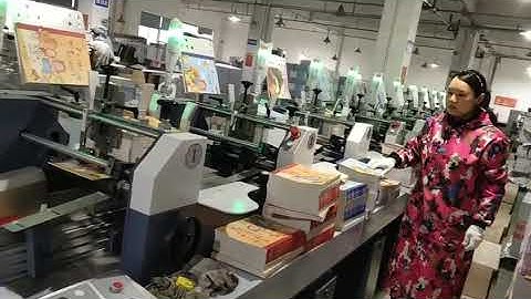 Book collating machine+shrink wrapping machine.  WhatsApp/WeChat: 008613520480036