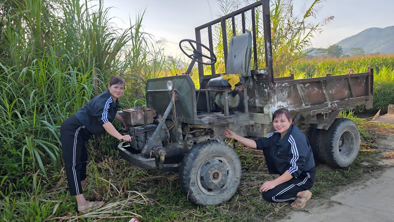 The girl repaired and restored the engine of a farm vehicle for her neighbor.