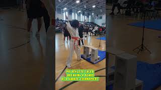 My Athlete Caleb Breaking a Board at a Karate Tournament.
