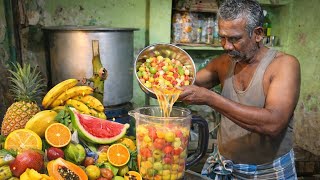 Old Man Making Special Fruit Mixed Juice