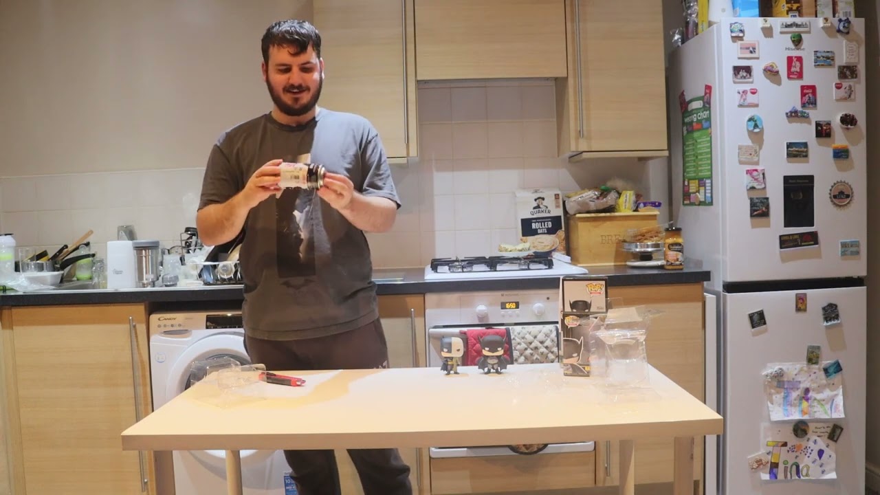 Unboxing two batman funko pops and one batman funko soda