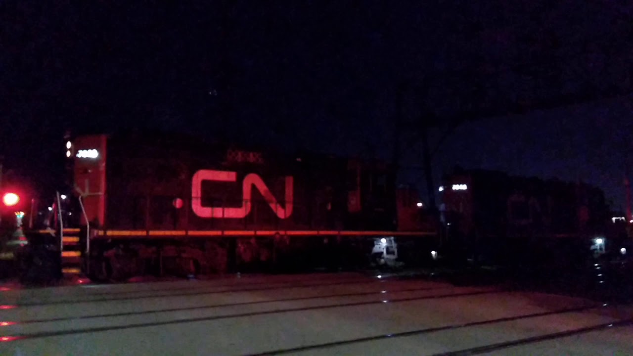 CN GP9 EMD 7022 & GP9 EMD 7052 In Oakville Crossing