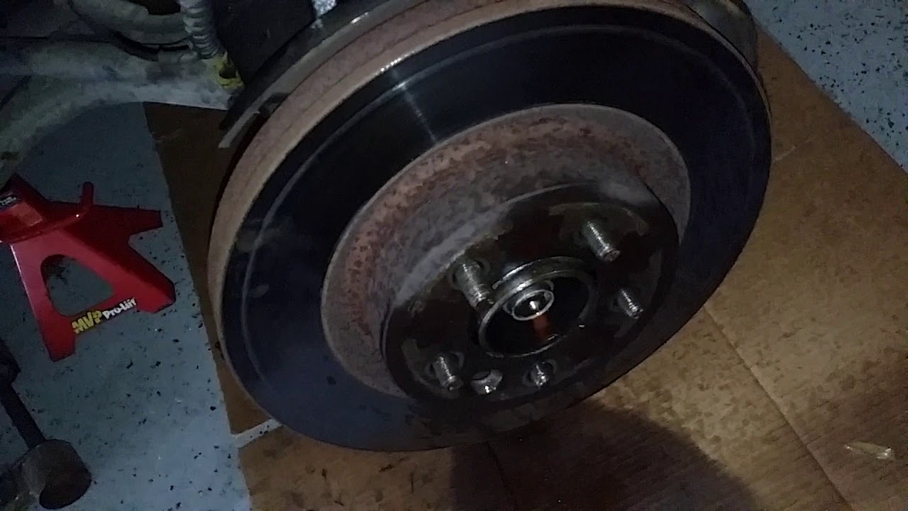 RANGE ROVER SPORT HSE 2008 FRONT ROTORS REPLACEMENT - YouTube