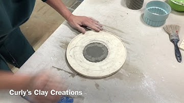 Hand building a slab mug in time lapse