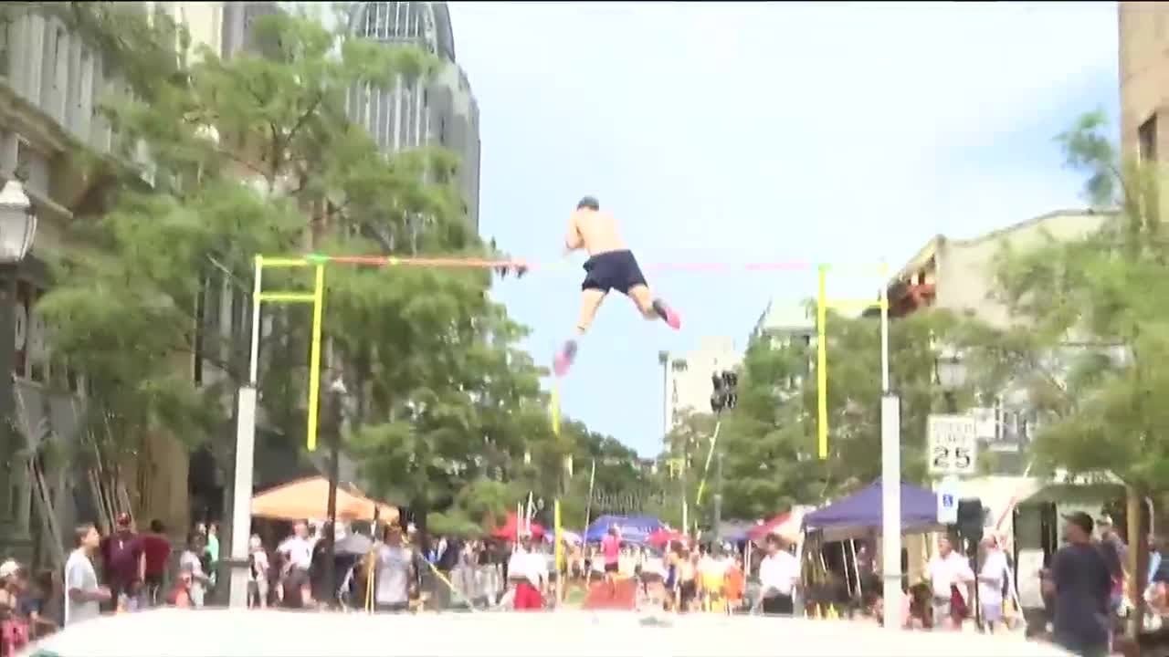 Athletes compete in Dauphin Street Vault