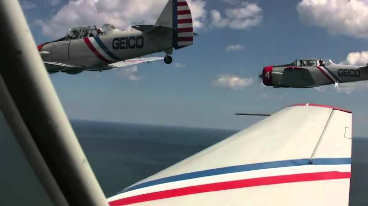 Geico Skytypers cruise over Lake Michigan