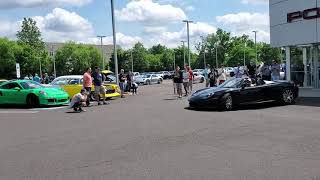 Porsche Carrera GT leaving Cars and Coffee.