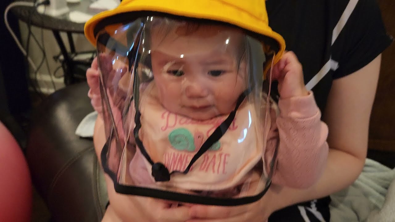 Baby Angie doesn't like her PPE gear 