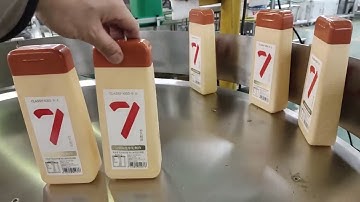 Flat square bottle double sides label applicator front and back labeling machine test video