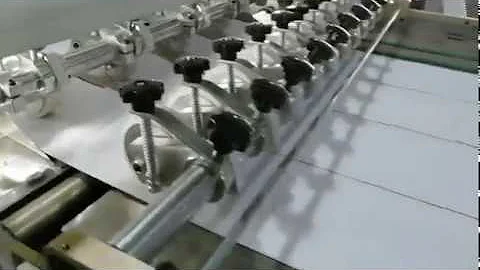 HQJ A4 Four Rolls Feeding Paper Sheets Cutting Machine And Reams Packaging Machine