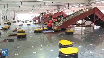 Army of robots efficiently sorting thousands of parcels per hour. Made in China
