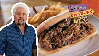 Guy Fieri Eats the Three-Meat Octavian Sandwich | Diners, Drive-Ins and Dives | Food Network