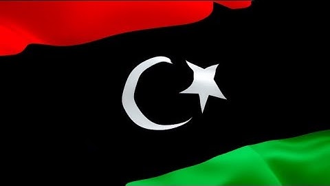 ‎Libyan‎ flag video waving in wind. Realistic Tripoli Flag background. Libya flag Full HD