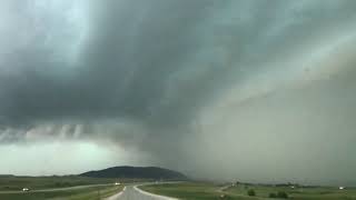DESTRUCTIVE hail busts out window near Sundance, WY on I90! News