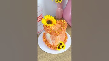 Marbled Buttercream Heart Cake made with Frost Form 🧡 www.frostform.com #cake #heartcakes