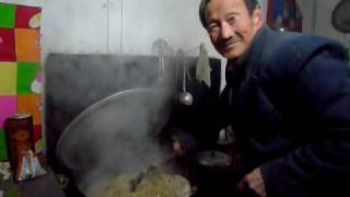 Man making pig fodder