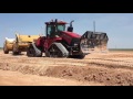 Grouser Dozer Blade on a Case Quadtrac Pulling Pans