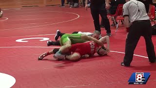 Behind Ouellette's 4-peat Noble wins A wrestling title