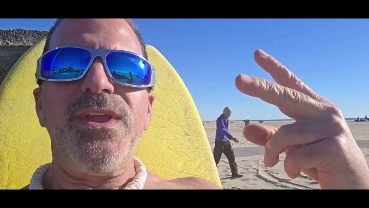 Huntington 1-10-26. Good waves,  chilling down with Sk8er girlz and Bono from U2!!!