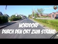 Mit dem Fahrrad durch Norddorf (Amrum) zum Strand