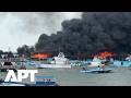 Massive Fire Destroys 35 Boats at Ecuador's Manta Port, Injuring Two | APT