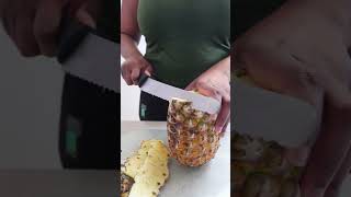 Peeling a Pineapple shorts pineapple