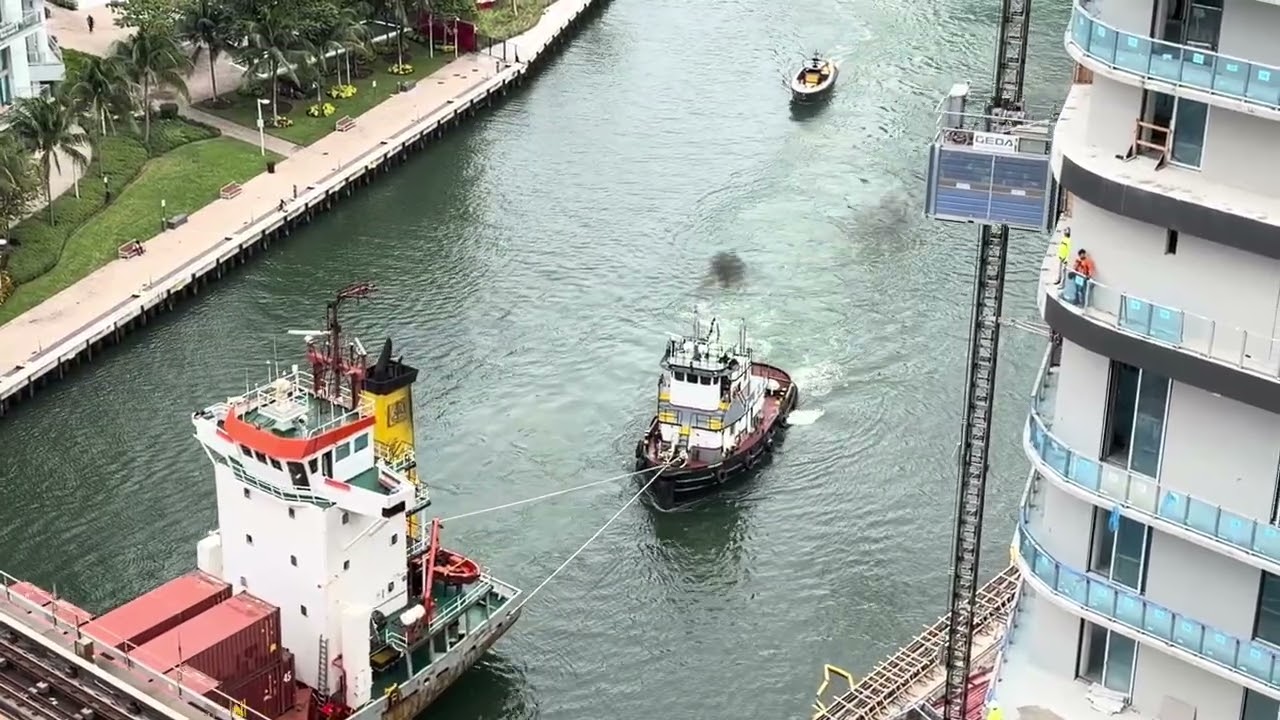 Tugboats Bringing The Antillean Line Into The Miami River 