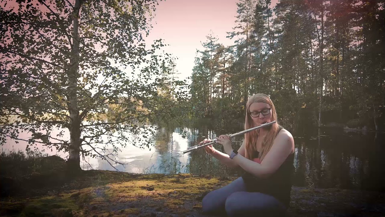 Peaceful flute improvisation by a lake