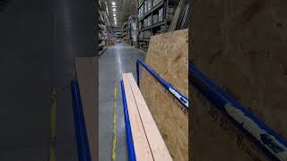 Pushing a cart full of lumber OSB plywood at Lowe's Montgomeryville PA