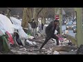 Thousands of asylum seekers waiting in streets, makeshift camps around Paris