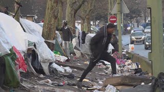 Thousands of asylum seekers waiting in streets, makeshift camps around Paris
