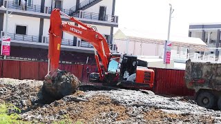 Awesome operation Excavator Hitachi Zaxis 210LCH moving mud to heavy dump truck