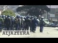 Zimbabwe police violently break up anti-Mugabe protests