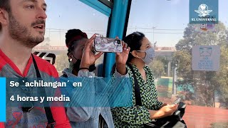 Extranjeros turistean en el Cablebús en Iztapalapa
