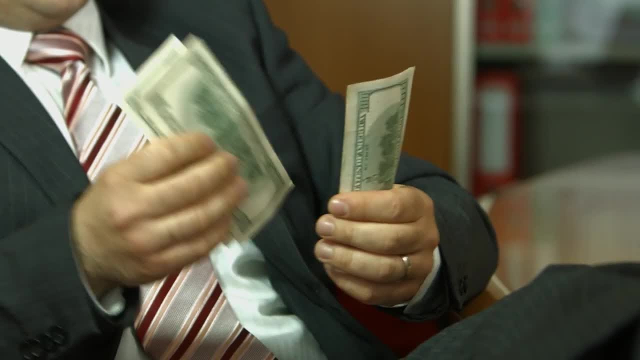 Businessman counting money Stock Video - YouTube