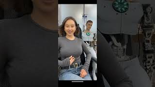 Live beautiful girl is very happy to make AI robot