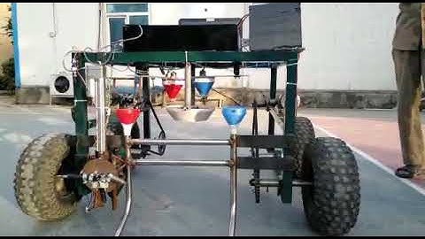 Semi-autonomous seed sowing and fertilizer spraying robot (Agrobot)